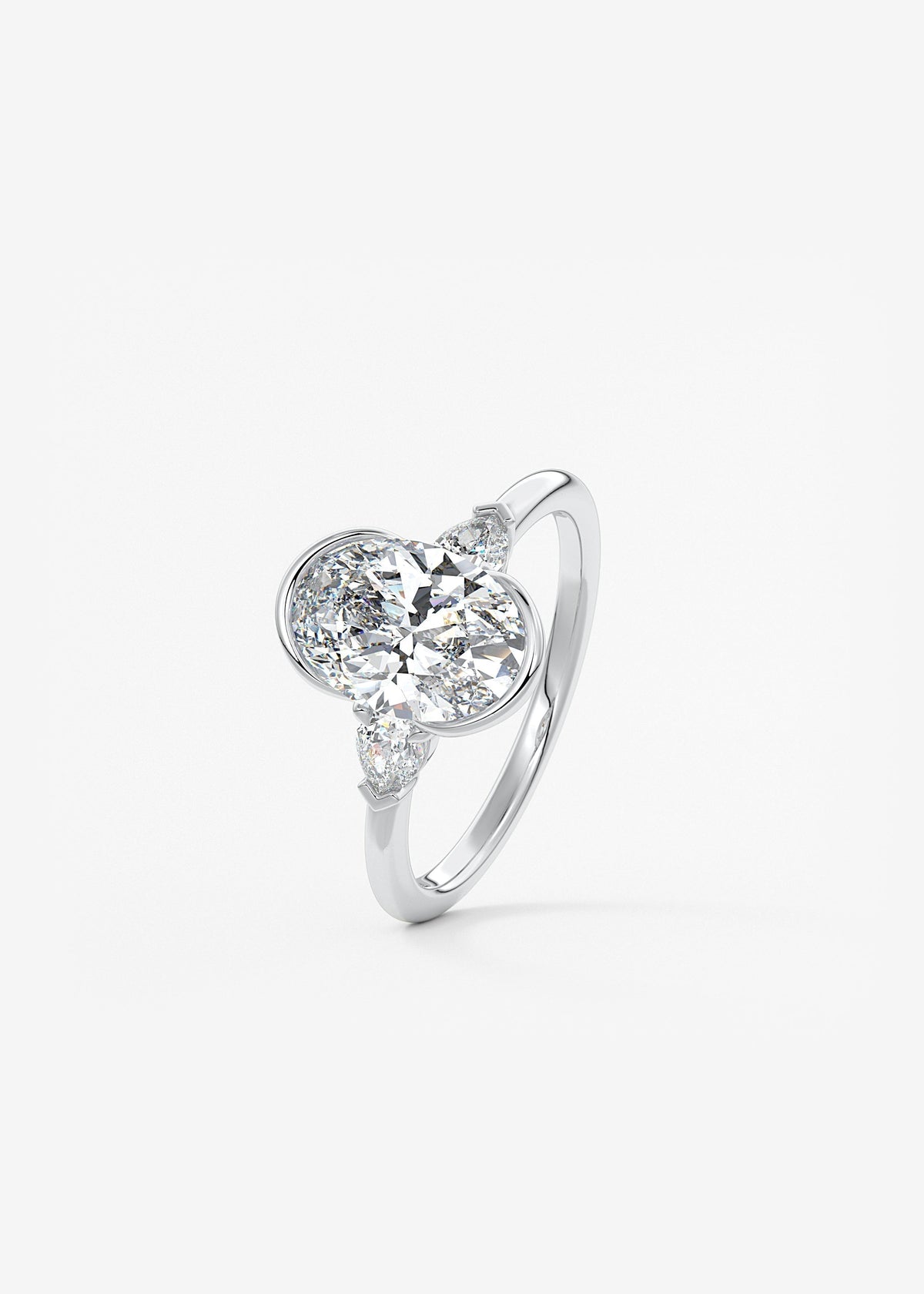 Oval Three Stone Bezel Lab Grown Diamond Engagement Ring