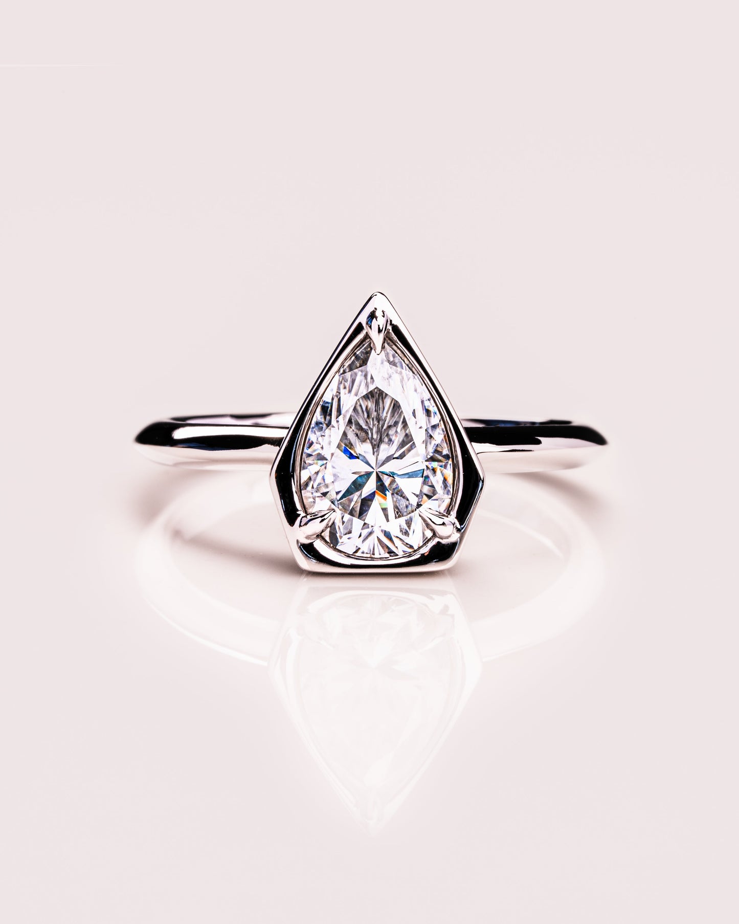 1.33 CT Pear Cut Bezel Solitaire Lab Grown Diamond Engagement Ring