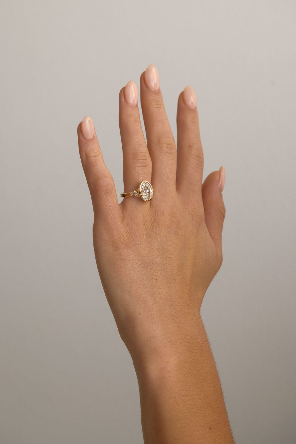 2.00 CT Round Bezel Pavé Lab Grown Diamond Engagement Ring with Oval Diamond Accents