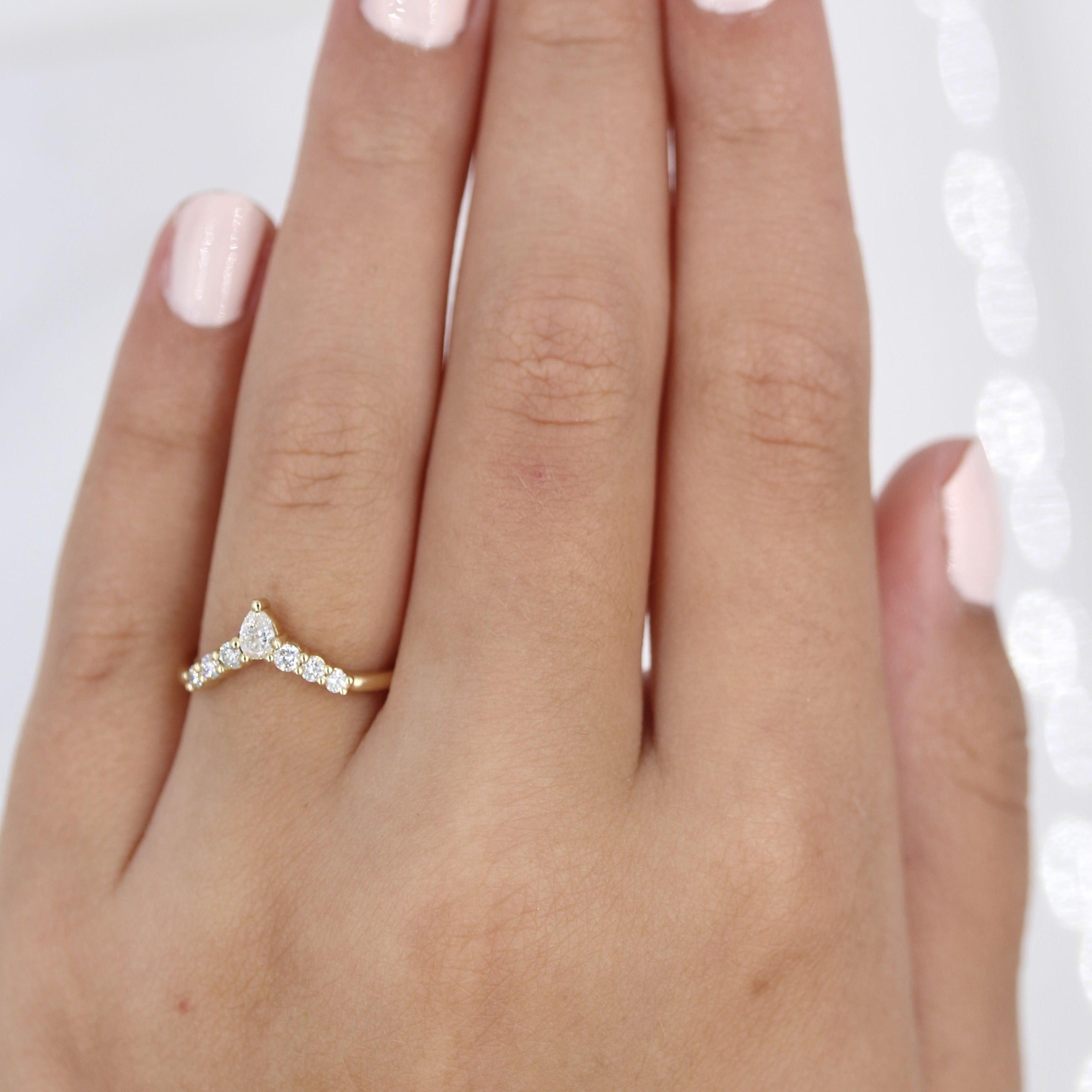 0.31 TCW Round & Pear Cut Curved Moissanite Wedding Band 2 0.31 TCW Round & Pear Cut Curved Moissanite Wedding Band 2