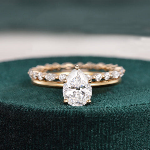 1.0 CT Pear Cut Solitaire Moissanite Bridal Ring Set 1 1.0 CT Pear Cut Solitaire Moissanite Bridal Ring Set 1