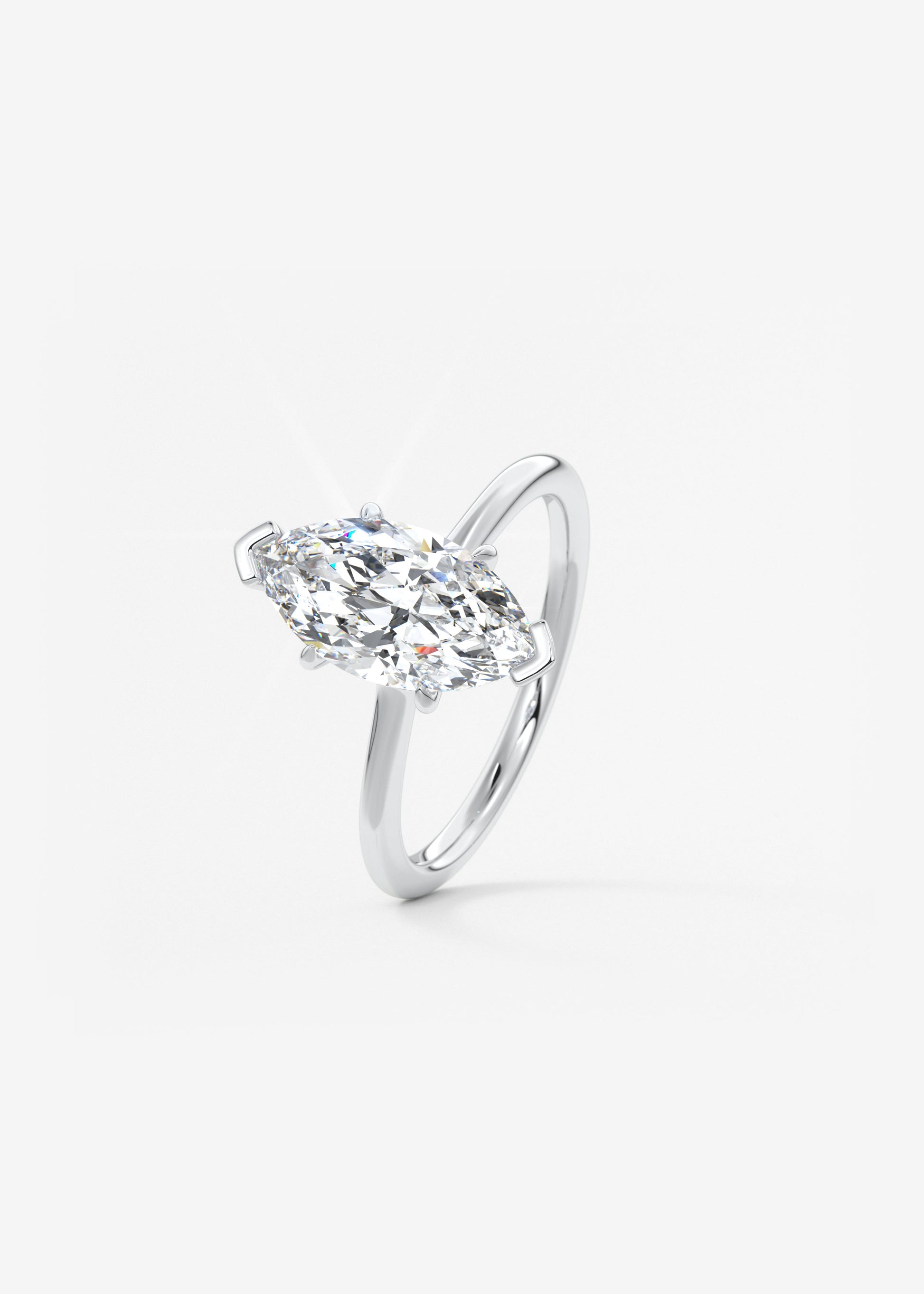 Marquise Three Stone Bezel Lab Grown Diamond Engagement Ring