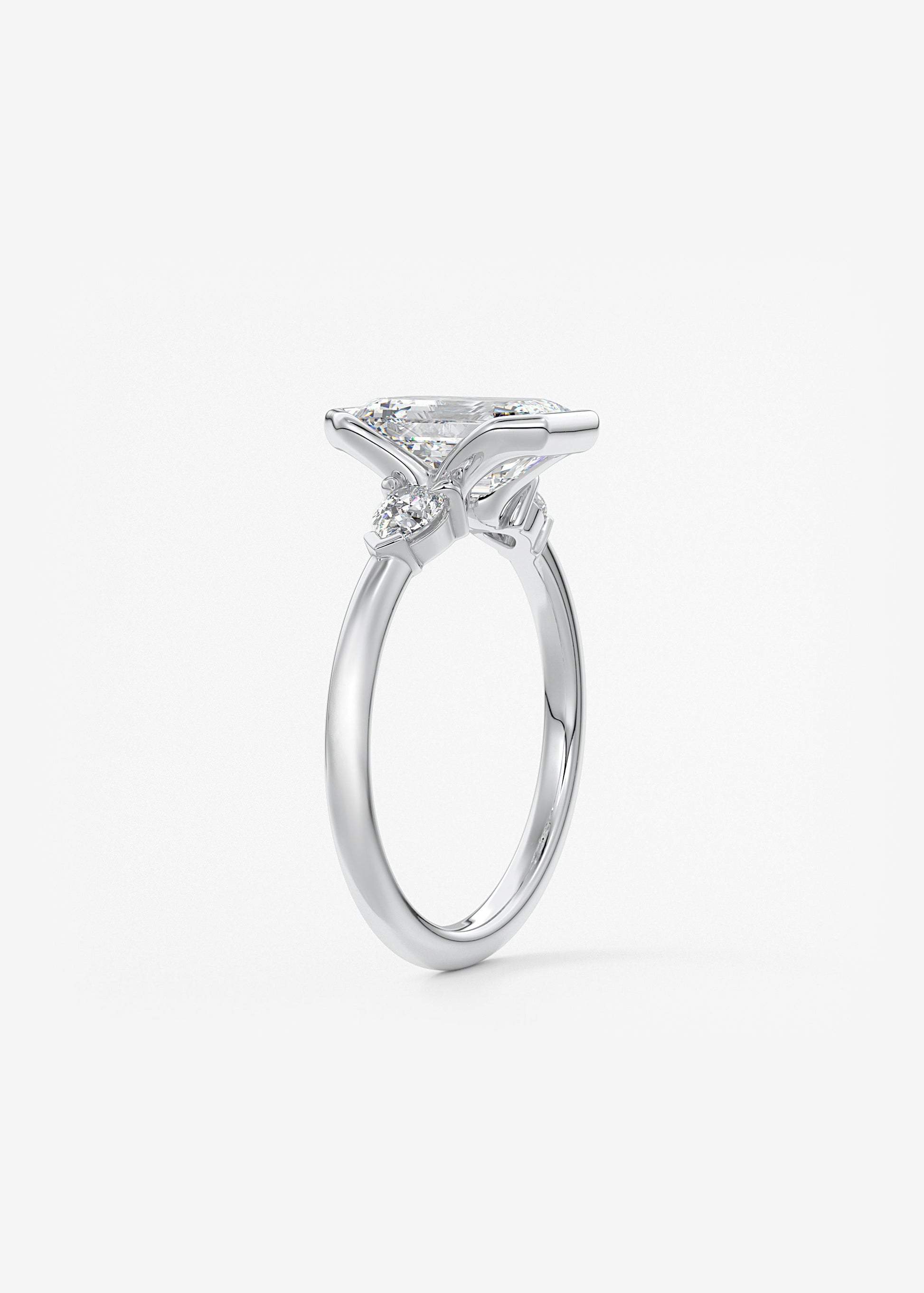 Emerald Three Stone Bezel Lab Grown Diamond Engagement Ring