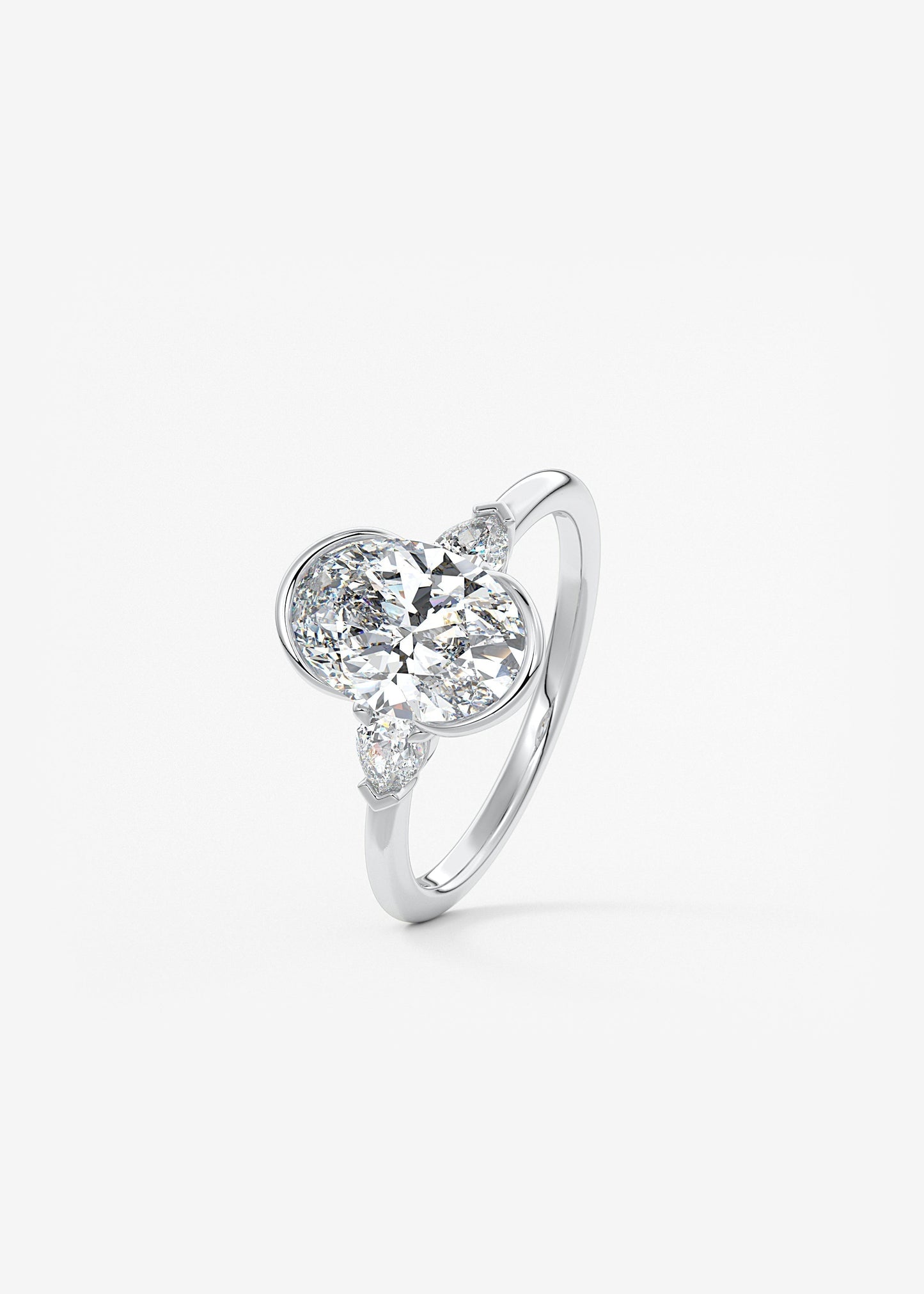 Oval Three Stone Bezel Lab Grown Diamond Engagement Ring