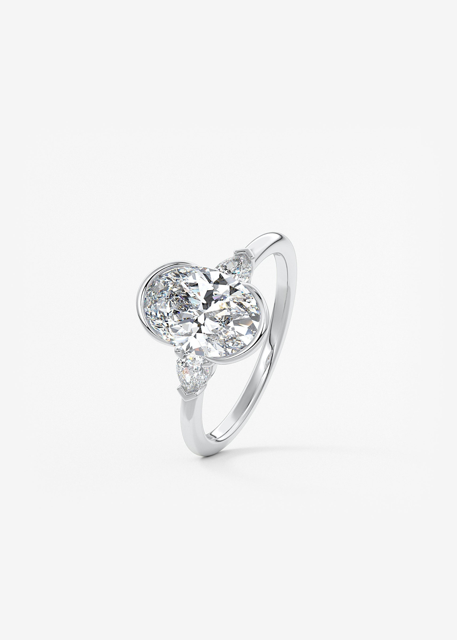 Oval Three Stone Bezel Lab Grown Diamond Engagement Ring