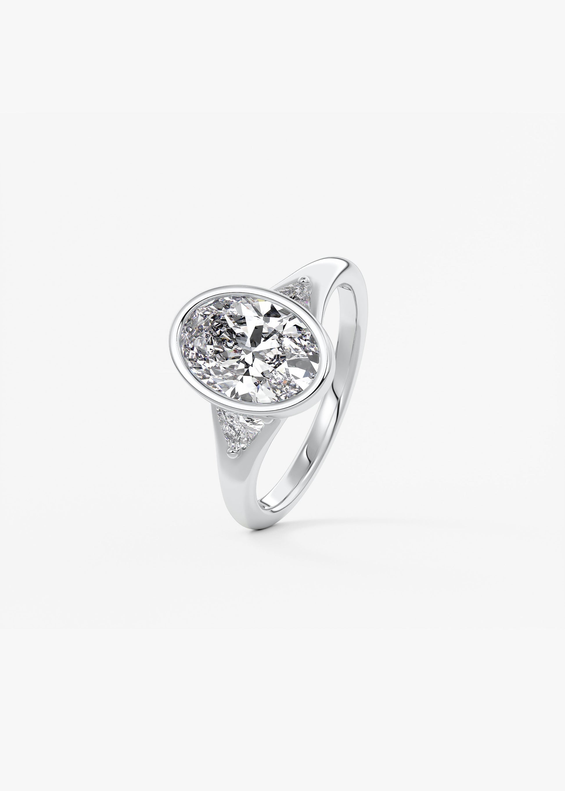 Oval Three Stone Bezel Lab Grown Diamond Engagement Ring