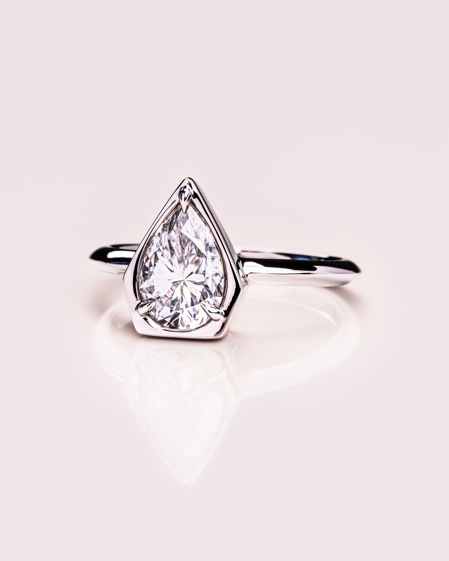 1.33 CT Pear Cut Bezel Solitaire Lab Grown Diamond Engagement Ring