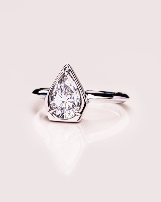 1.33 CT Pear Cut Bezel Solitaire Lab Grown Diamond Engagement Ring