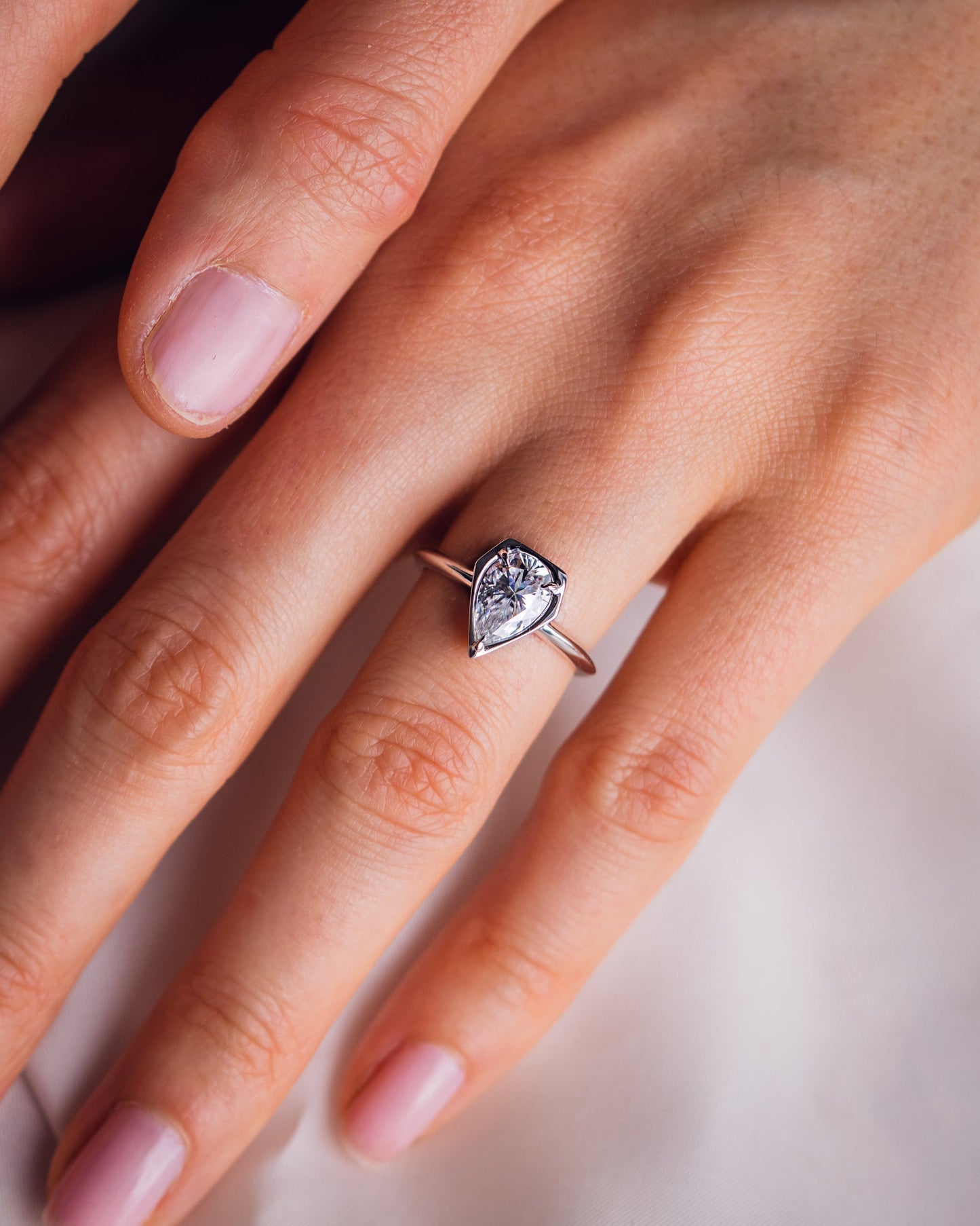 1.33 CT Pear Cut Bezel Solitaire Lab Grown Diamond Engagement Ring