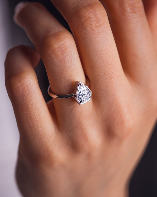 1.33 CT Pear Cut Bezel Solitaire Lab Grown Diamond Engagement Ring