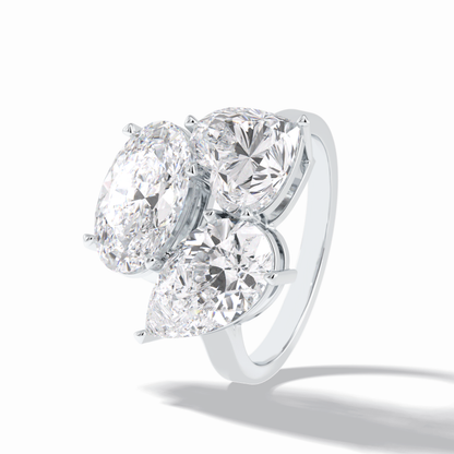 The Eternal Trio Ring – 6.00 TCW Oval & Pear Three-Stone Masterpiece