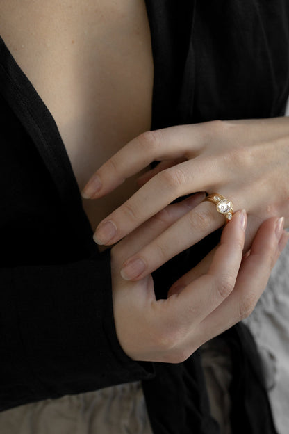 2.31 CT Oval Three Stone Bezel Lab Grown Diamond Engagement Ring with Round Diamond Accents