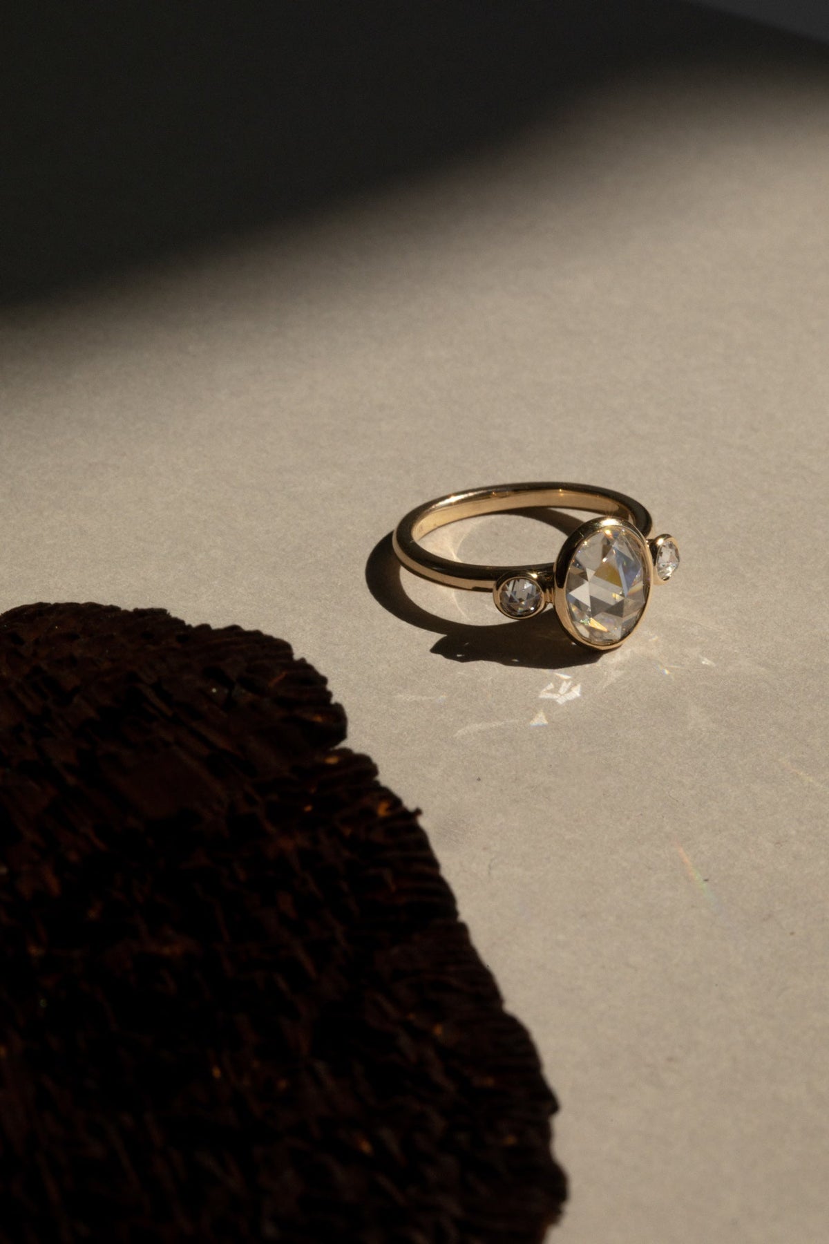 2.31 CT Oval Three Stone Bezel Lab Grown Diamond Engagement Ring with Round Diamond Accents