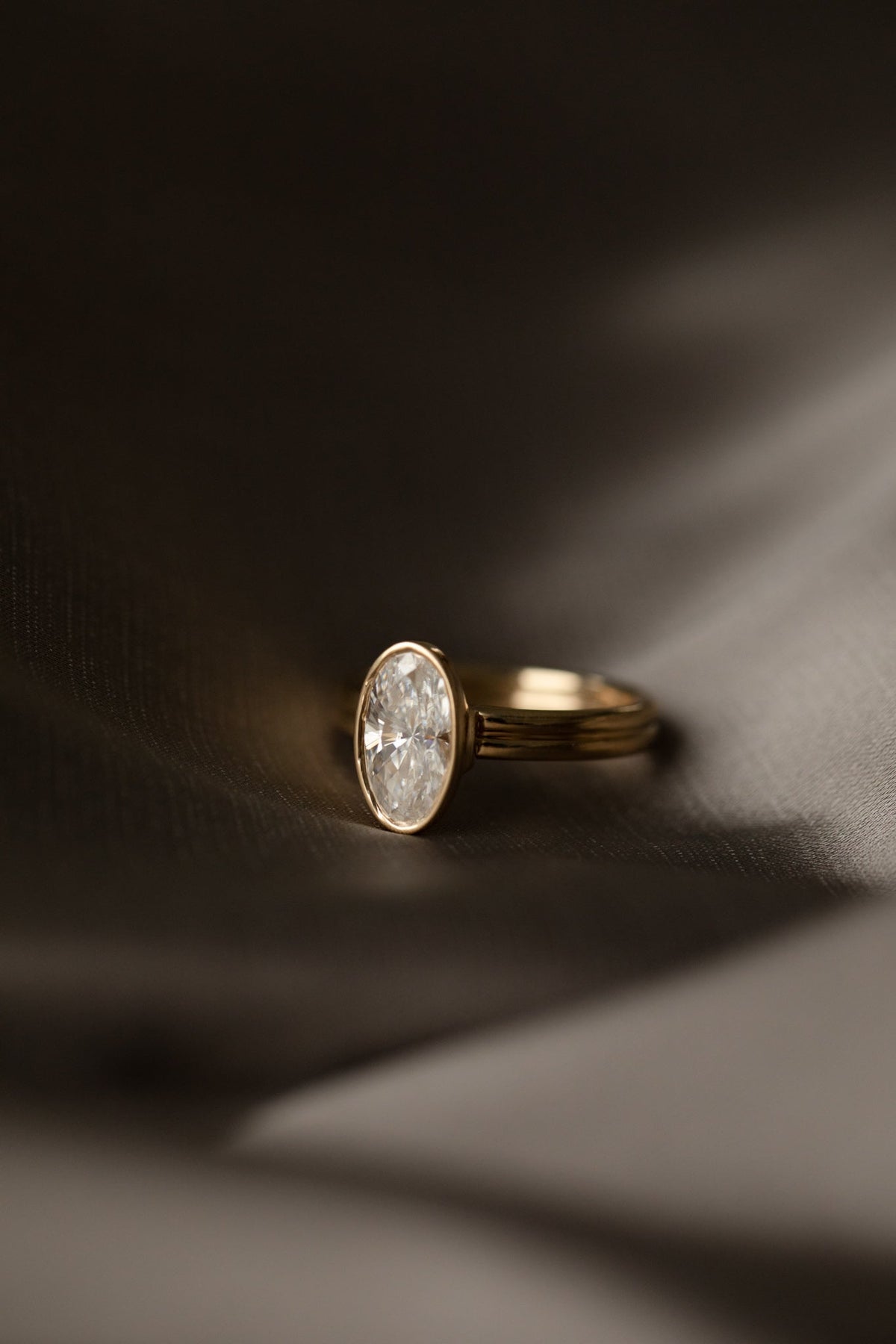1.50 CT Moval Bezel Lab Grown Diamond Engagement Ring