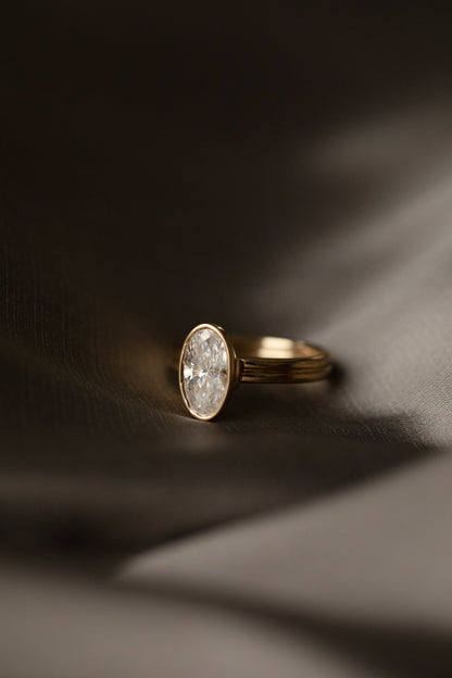 1.50 CT Moval Bezel Lab Grown Diamond Engagement Ring