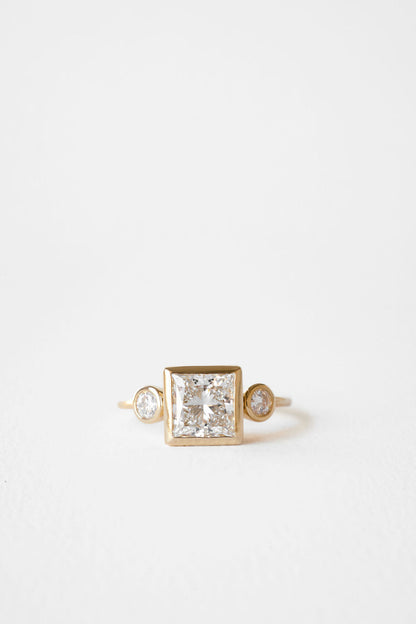 2.12 CT Princess Three Stone Lab Grown Diamond Engagement Ring with Round Diamond Accents