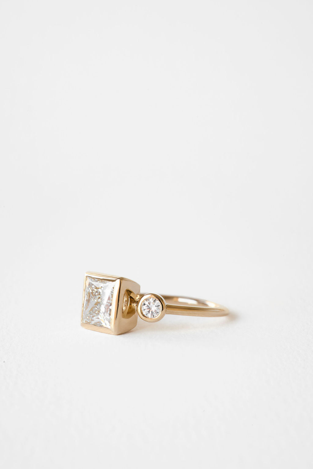 2.12 CT Princess Three Stone Lab Grown Diamond Engagement Ring with Round Diamond Accents