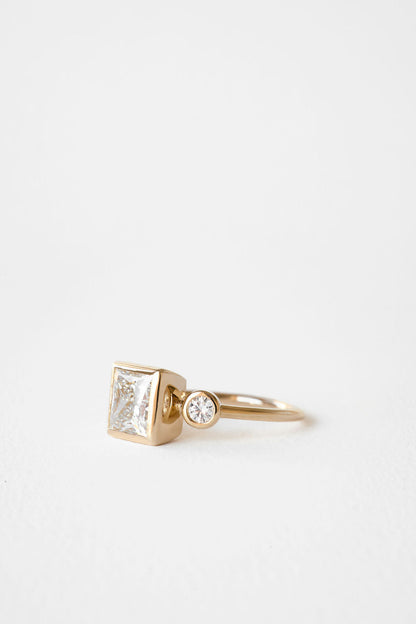 2.12 CT Princess Three Stone Lab Grown Diamond Engagement Ring with Round Diamond Accents