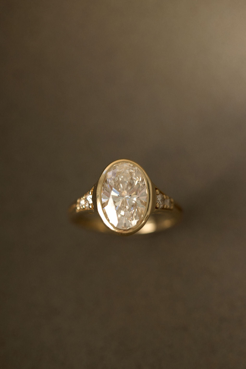 2.00 CT Round Bezel Pavé Lab Grown Diamond Engagement Ring with Oval Diamond Accents