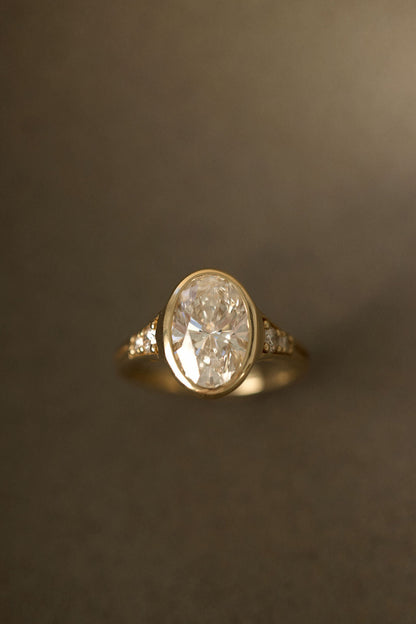 2.00 CT Round Bezel Pavé Lab Grown Diamond Engagement Ring with Oval Diamond Accents