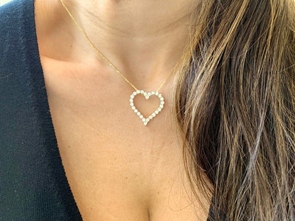 0.3 TCW Round Shape Moissanite Heart Style Necklace