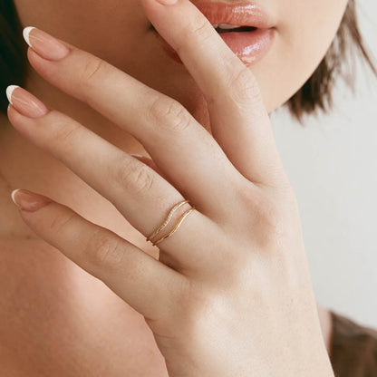 0.02 TCW Round Moissanite Wave Wedding Band