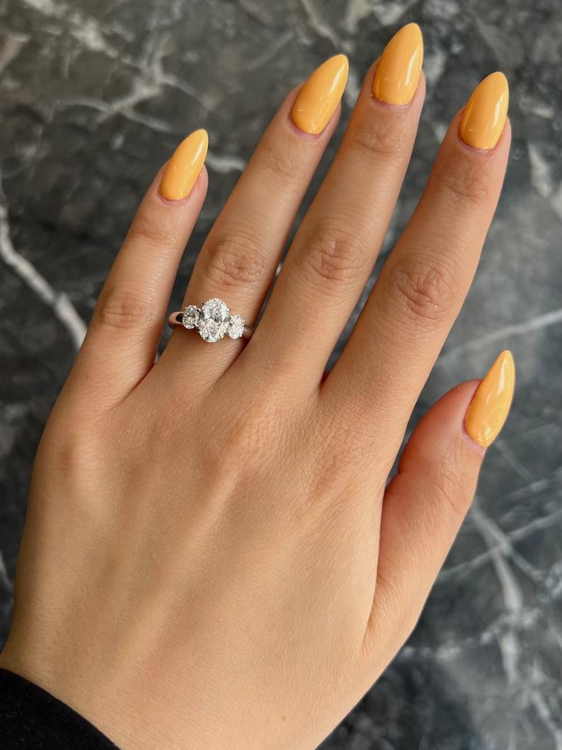 1.50 CT Oval Three Stones Lab Grown Diamond Engagement Ring