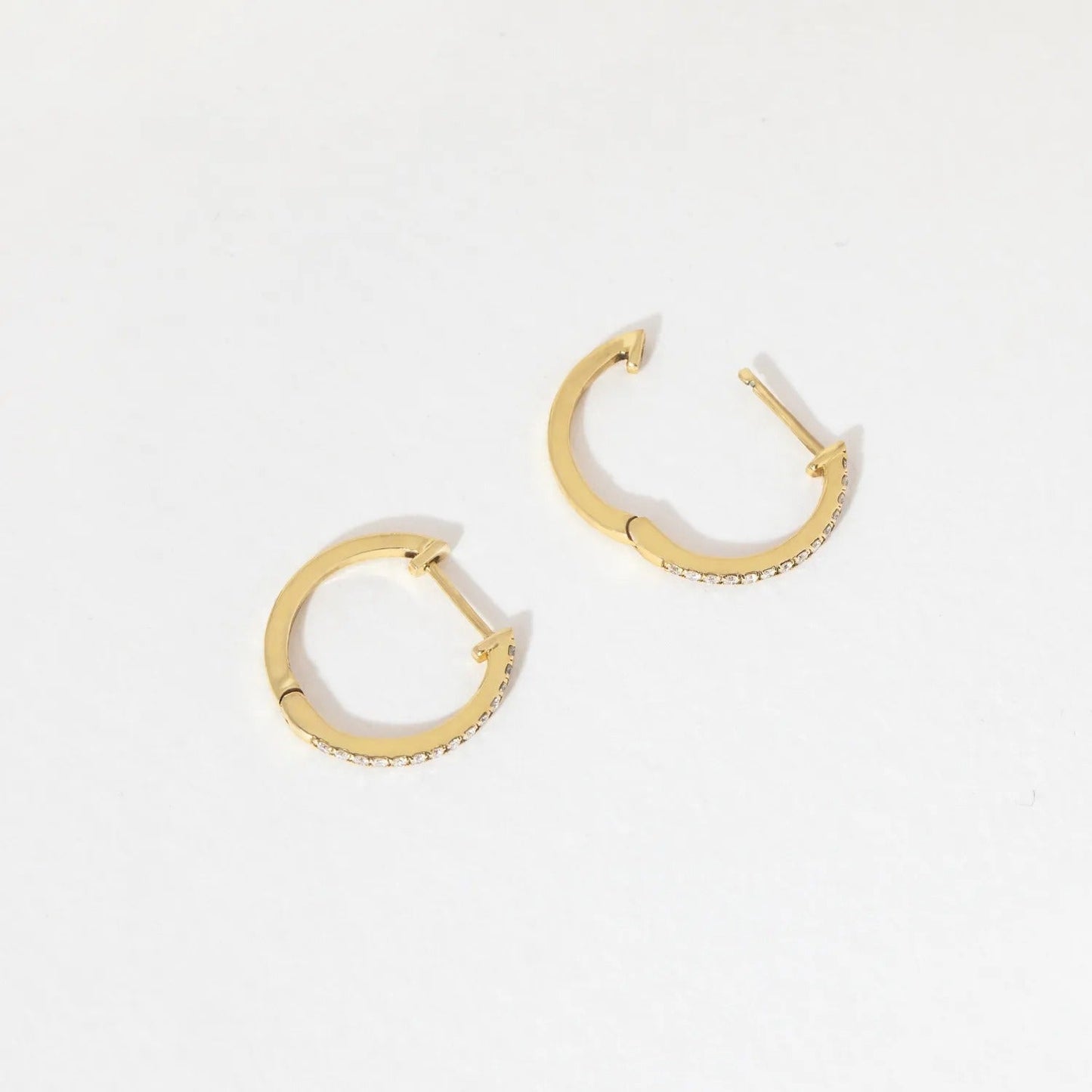 0.6 TCW Round Moissanite Hoop Earrings